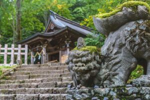 The stone guardian dog of togakushi shrine